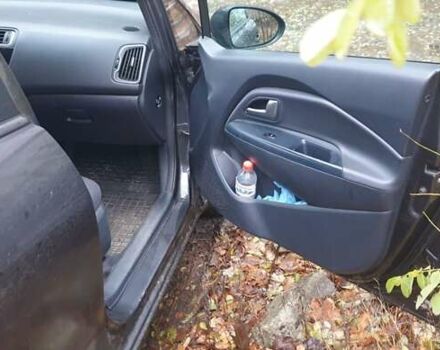 Сірий Кіа Ріо, об'ємом двигуна 1.4 л та пробігом 142 тис. км за 11500 $, фото 5 на Automoto.ua