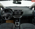 Серый Киа Рио, объемом двигателя 1.4 л и пробегом 75 тыс. км за 8988 $, фото 9 на Automoto.ua