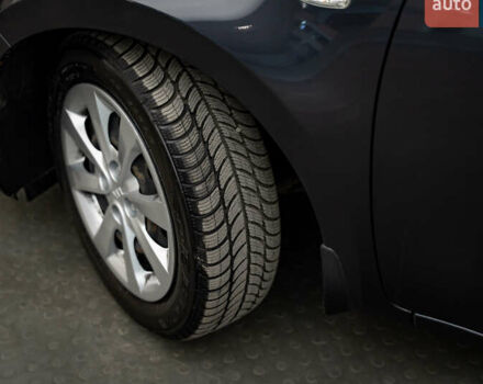 Серый Киа Рио, объемом двигателя 1.4 л и пробегом 75 тыс. км за 8988 $, фото 7 на Automoto.ua