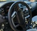 Сірий Кіа Ріо, об'ємом двигуна 1.37 л та пробігом 185 тис. км за 10800 $, фото 5 на Automoto.ua
