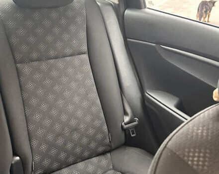 Серый Киа Рио, объемом двигателя 1.59 л и пробегом 122 тыс. км за 14800 $, фото 8 на Automoto.ua