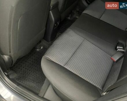 Серый Киа Рио, объемом двигателя 1.59 л и пробегом 70 тыс. км за 15300 $, фото 11 на Automoto.ua