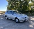 Серый Киа Рио, объемом двигателя 1.4 л и пробегом 111 тыс. км за 2009 $, фото 1 на Automoto.ua