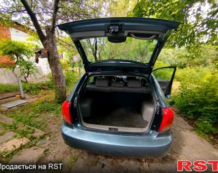 Сірий Кіа Ріо, об'ємом двигуна 1.5 л та пробігом 315 тис. км за 2300 $, фото 3 на Automoto.ua