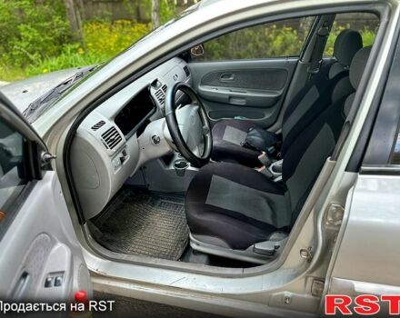 Серый Киа Рио, объемом двигателя 1.3 л и пробегом 206 тыс. км за 1750 $, фото 5 на Automoto.ua