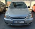 Сірий Кіа Ріо, об'ємом двигуна 1.34 л та пробігом 394 тис. км за 2300 $, фото 1 на Automoto.ua