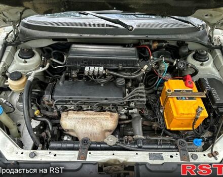 Серый Киа Рио, объемом двигателя 1.3 л и пробегом 206 тыс. км за 1750 $, фото 11 на Automoto.ua