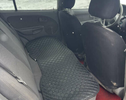 Сірий Кіа Ріо, об'ємом двигуна 1.34 л та пробігом 402 тис. км за 3300 $, фото 11 на Automoto.ua