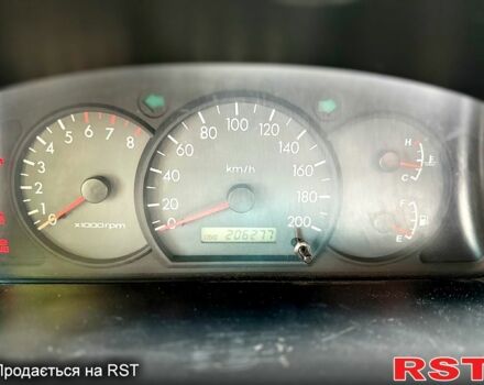 Серый Киа Рио, объемом двигателя 1.3 л и пробегом 206 тыс. км за 1750 $, фото 12 на Automoto.ua