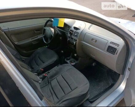Серый Киа Рио, объемом двигателя 1.34 л и пробегом 214 тыс. км за 3100 $, фото 6 на Automoto.ua