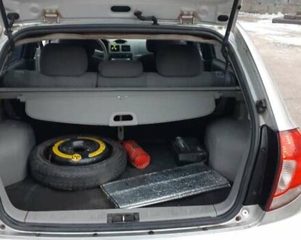 Серый Киа Рио, объемом двигателя 1.34 л и пробегом 145 тыс. км за 2300 $, фото 11 на Automoto.ua