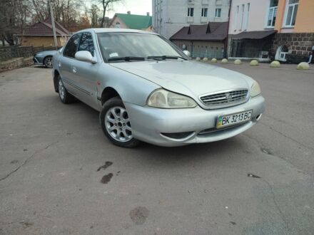 Серый Киа Рио, объемом двигателя 1.8 л и пробегом 250 тыс. км за 1350 $, фото 1 на Automoto.ua