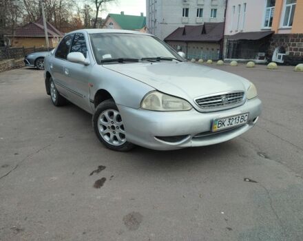 Серый Киа Рио, объемом двигателя 1.8 л и пробегом 250 тыс. км за 1350 $, фото 1 на Automoto.ua