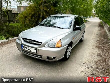 Серый Киа Рио, объемом двигателя 1.3 л и пробегом 206 тыс. км за 1750 $, фото 1 на Automoto.ua
