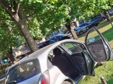 Сірий Кіа Ріо, об'ємом двигуна 1.4 л та пробігом 240 тис. км за 5000 $, фото 1 на Automoto.ua