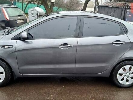 Серый Киа Рио, объемом двигателя 1.4 л и пробегом 243 тыс. км за 5700 $, фото 1 на Automoto.ua