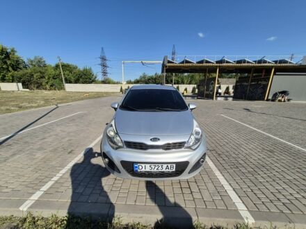 Серый Киа Рио, объемом двигателя 1.4 л и пробегом 254 тыс. км за 6497 $, фото 1 на Automoto.ua