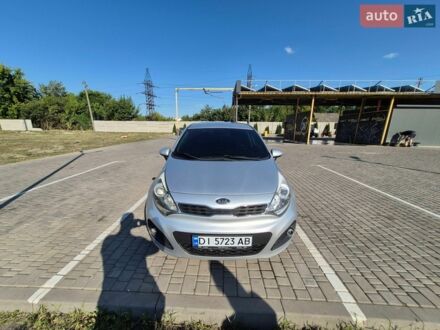 Серый Киа Рио, объемом двигателя 1.4 л и пробегом 254 тыс. км за 6500 $, фото 1 на Automoto.ua