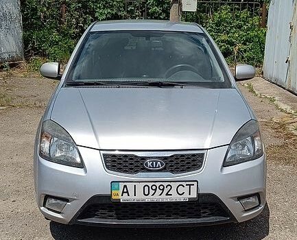 Серый Киа Рио, объемом двигателя 1.4 л и пробегом 94 тыс. км за 6660 $, фото 1 на Automoto.ua