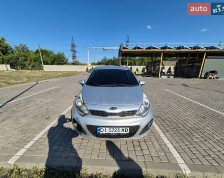 Серый Киа Рио, объемом двигателя 1.4 л и пробегом 254 тыс. км за 6500 $, фото 1 на Automoto.ua
