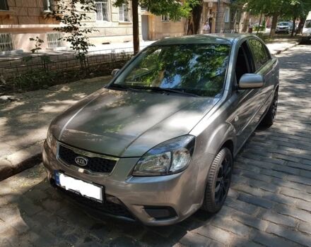 Сірий Кіа Ріо, об'ємом двигуна 1.4 л та пробігом 150 тис. км за 7700 $, фото 1 на Automoto.ua