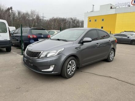 Серый Киа Рио, объемом двигателя 1.4 л и пробегом 223 тыс. км за 5650 $, фото 1 на Automoto.ua