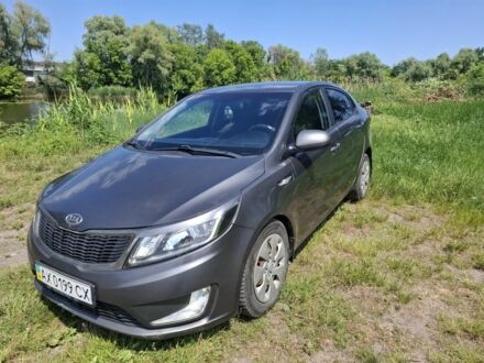 Серый Киа Рио, объемом двигателя 1.4 л и пробегом 235 тыс. км за 5800 $, фото 1 на Automoto.ua