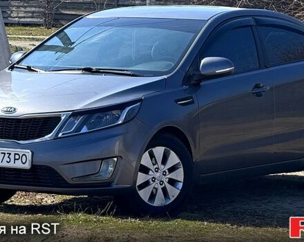 Серый Киа Рио, объемом двигателя 1.6 л и пробегом 180 тыс. км за 7800 $, фото 1 на Automoto.ua