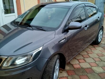 Сірий Кіа Ріо, об'ємом двигуна 1.4 л та пробігом 206 тис. км за 7800 $, фото 1 на Automoto.ua