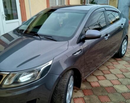 Сірий Кіа Ріо, об'ємом двигуна 1.4 л та пробігом 206 тис. км за 7800 $, фото 1 на Automoto.ua