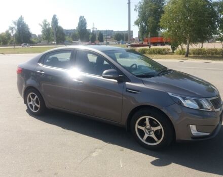 Сірий Кіа Ріо, об'ємом двигуна 1.6 л та пробігом 70 тис. км за 10400 $, фото 1 на Automoto.ua