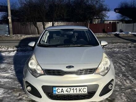 Сірий Кіа Ріо, об'ємом двигуна 1.12 л та пробігом 220 тис. км за 5750 $, фото 1 на Automoto.ua