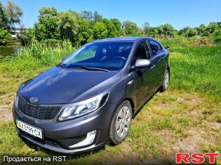Серый Киа Рио, объемом двигателя 1.4 л и пробегом 235 тыс. км за 5600 $, фото 1 на Automoto.ua