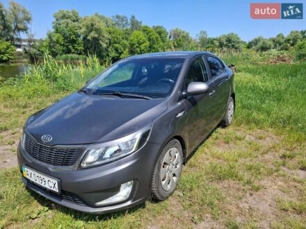 Серый Киа Рио, объемом двигателя 1.4 л и пробегом 235 тыс. км за 5600 $, фото 1 на Automoto.ua