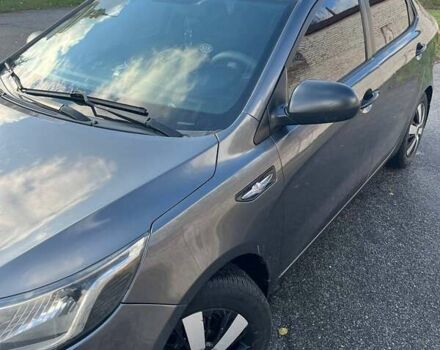 Серый Киа Рио, объемом двигателя 1.4 л и пробегом 190 тыс. км за 7000 $, фото 1 на Automoto.ua