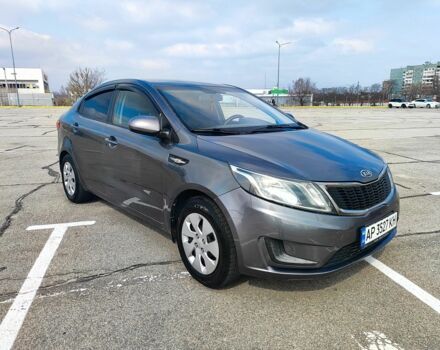 Серый Киа Рио, объемом двигателя 1.4 л и пробегом 260 тыс. км за 5000 $, фото 1 на Automoto.ua