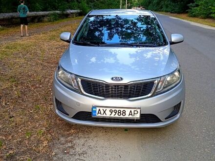 Серый Киа Рио, объемом двигателя 1.4 л и пробегом 230 тыс. км за 5750 $, фото 1 на Automoto.ua