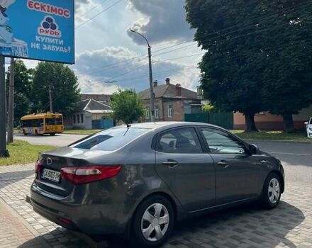 Сірий Кіа Ріо, об'ємом двигуна 1.4 л та пробігом 256 тис. км за 7000 $, фото 1 на Automoto.ua