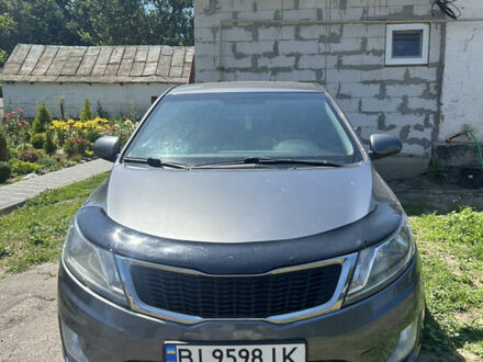 Серый Киа Рио, объемом двигателя 1.6 л и пробегом 250 тыс. км за 8299 $, фото 1 на Automoto.ua