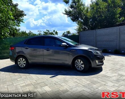 Серый Киа Рио, объемом двигателя 1.6 л и пробегом 173 тыс. км за 8100 $, фото 1 на Automoto.ua