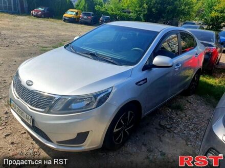 Серый Киа Рио, объемом двигателя 1.4 л и пробегом 145 тыс. км за 8210 $, фото 1 на Automoto.ua