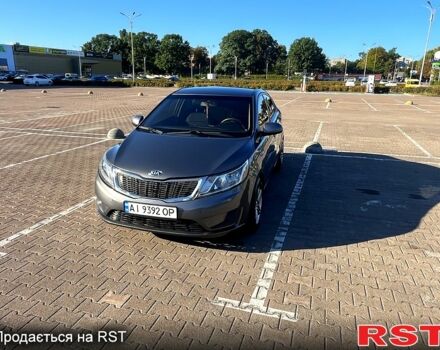 Серый Киа Рио, объемом двигателя 1.4 л и пробегом 75 тыс. км за 9100 $, фото 1 на Automoto.ua