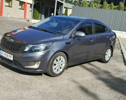 Серый Киа Рио, объемом двигателя 1.6 л и пробегом 177 тыс. км за 6904 $, фото 1 на Automoto.ua
