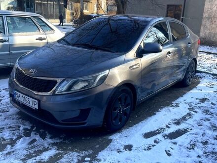 Серый Киа Рио, объемом двигателя 1.4 л и пробегом 250 тыс. км за 6800 $, фото 1 на Automoto.ua