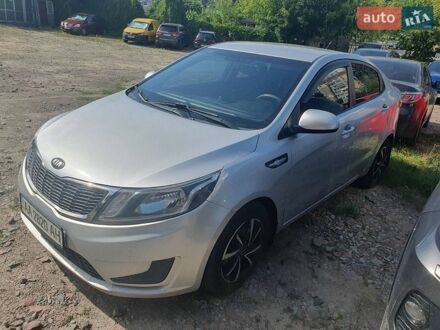 Серый Киа Рио, объемом двигателя 1.4 л и пробегом 145 тыс. км за 8227 $, фото 1 на Automoto.ua
