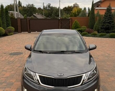 Серый Киа Рио, объемом двигателя 1.4 л и пробегом 91 тыс. км за 8450 $, фото 1 на Automoto.ua