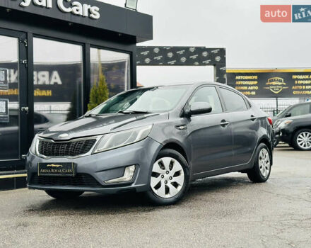Серый Киа Рио, объемом двигателя 1.4 л и пробегом 245 тыс. км за 5900 $, фото 1 на Automoto.ua