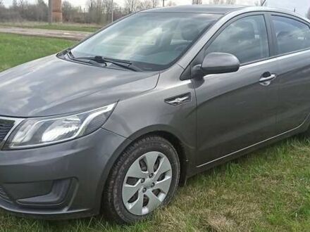 Серый Киа Рио, объемом двигателя 1.4 л и пробегом 70 тыс. км за 7550 $, фото 1 на Automoto.ua