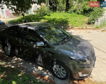 Серый Киа Рио, объемом двигателя 1.59 л и пробегом 258 тыс. км за 5600 $, фото 1 на Automoto.ua