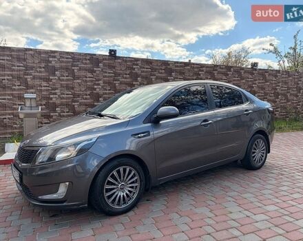 Серый Киа Рио, объемом двигателя 1.4 л и пробегом 231 тыс. км за 7800 $, фото 1 на Automoto.ua
